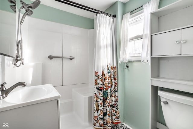 bathroom with vanity, a shower with curtain, and toilet