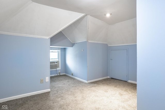 bonus room featuring carpet, cooling unit, and lofted ceiling