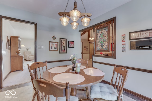 view of tiled dining space