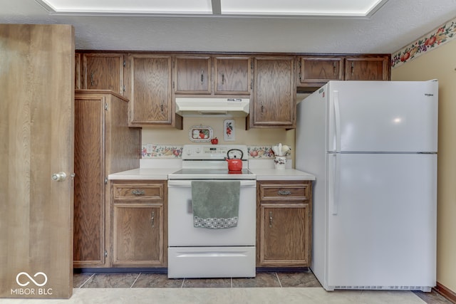 kitchen featuring white appliances