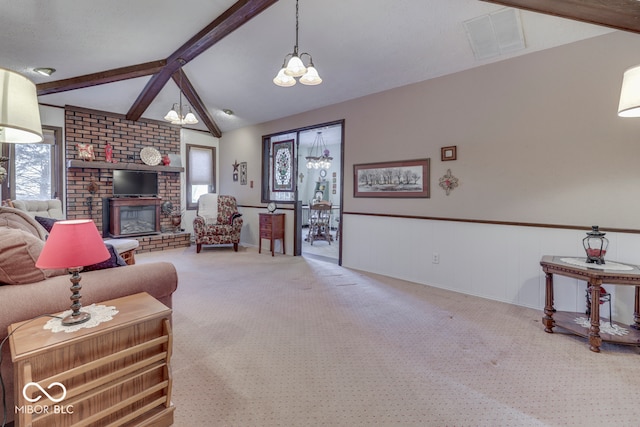 carpeted living room featuring vaulted ceiling with beams and a fireplace