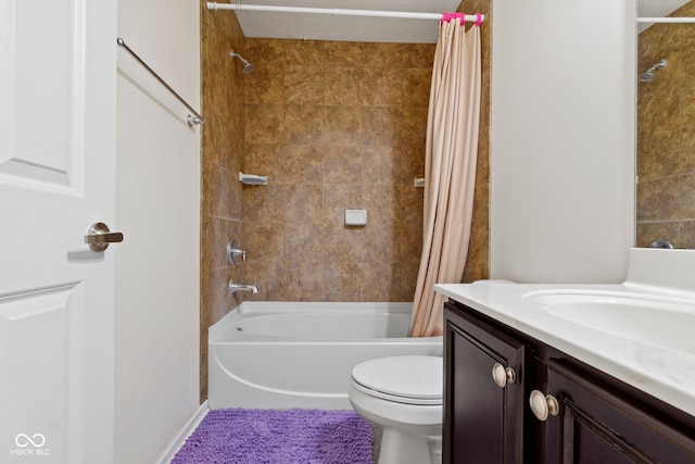 bathroom featuring toilet, shower / bathtub combination with curtain, and vanity