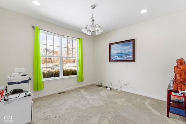 interior space featuring baseboards, recessed lighting, visible vents, and a notable chandelier