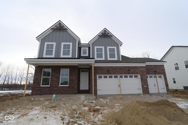 view of front of house featuring a garage and covered porch