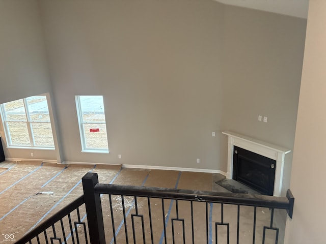 interior space featuring a towering ceiling