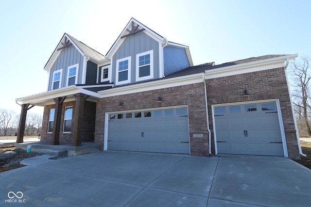 view of front facade with concrete driveway, brick siding, and board and batten siding