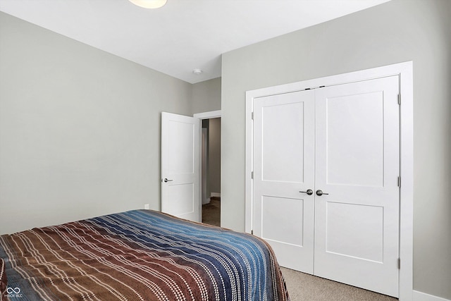 unfurnished bedroom featuring a closet and carpet