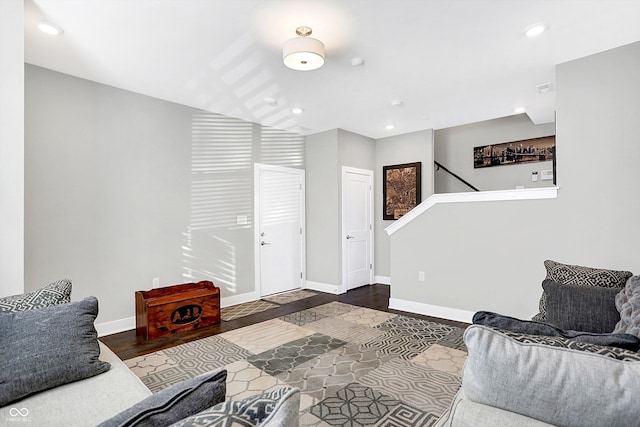 living room featuring dark hardwood / wood-style flooring