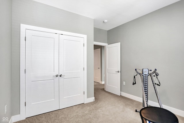 workout room with light carpet