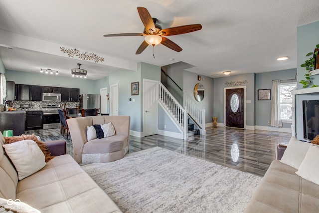 living room featuring ceiling fan