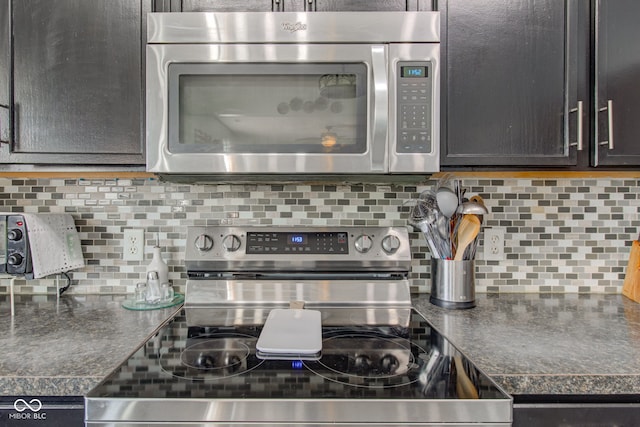 kitchen featuring tasteful backsplash and appliances with stainless steel finishes