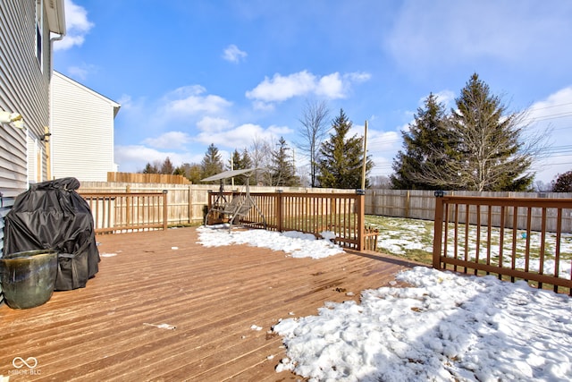 view of snow covered deck