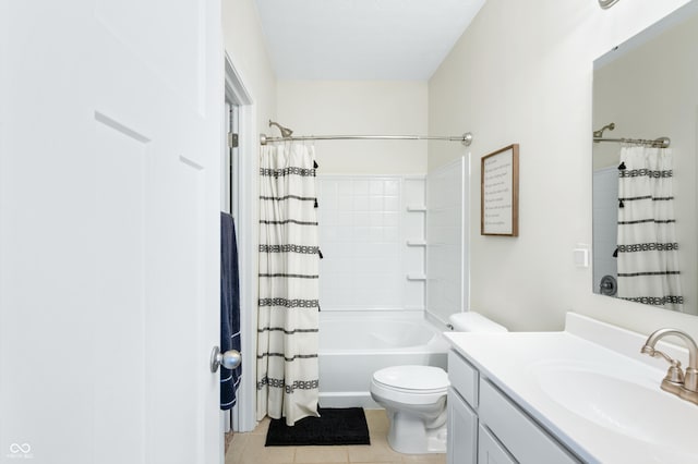 full bathroom with vanity, toilet, tile patterned flooring, and shower / bath combo