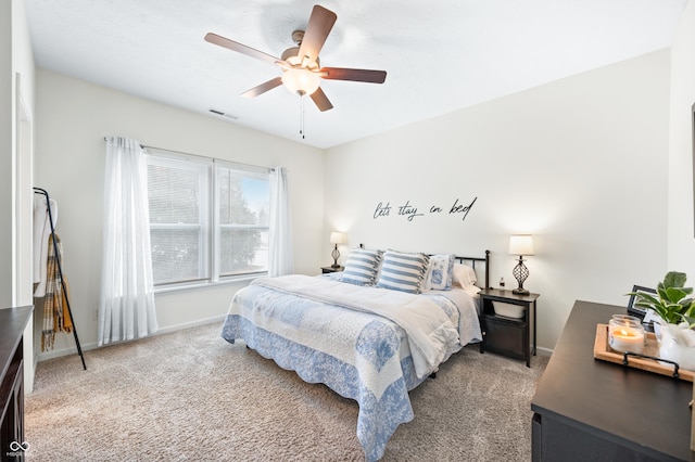 carpeted bedroom featuring ceiling fan