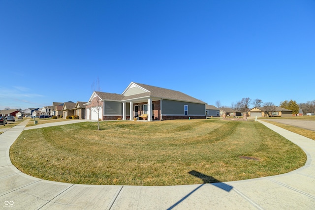 view of side of property with a lawn