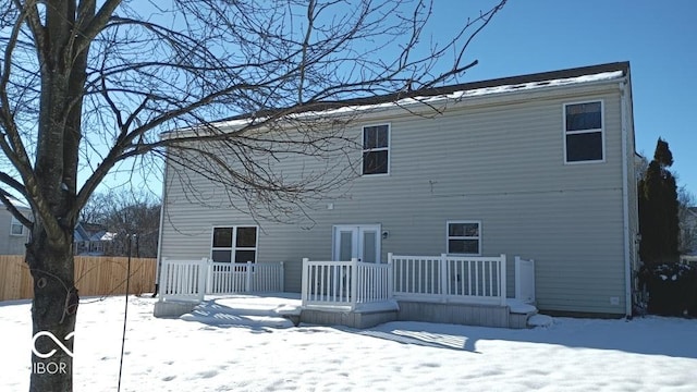 view of snow covered house