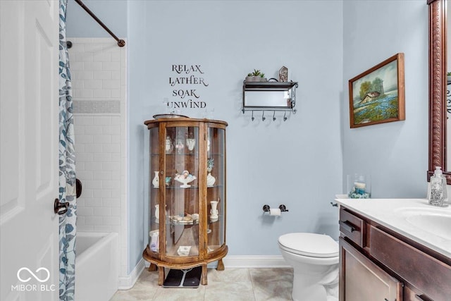 full bathroom featuring vanity, toilet, tile patterned floors, and shower / tub combo with curtain