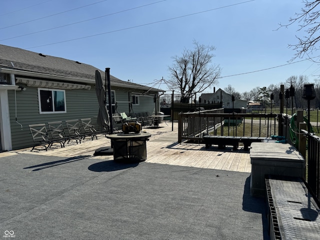 deck with an outdoor fire pit