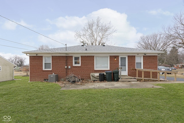 rear view of house with a lawn