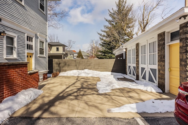 view of snow covered patio