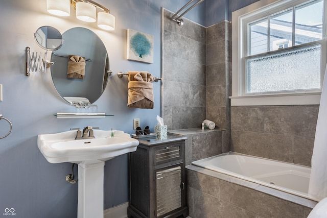 bathroom with shower / tub combo