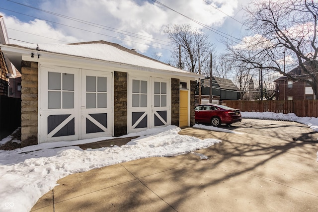 view of snow covered garage