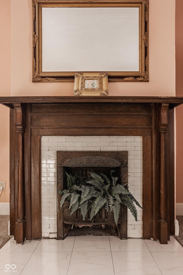 room details featuring a brick fireplace