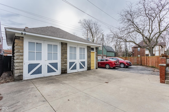 garage featuring fence