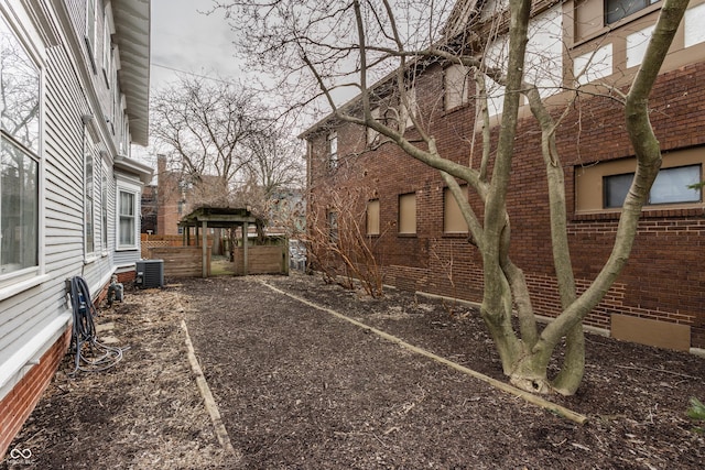 view of yard featuring central AC