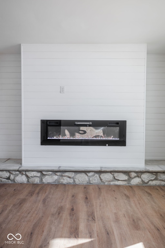 details featuring wood-type flooring