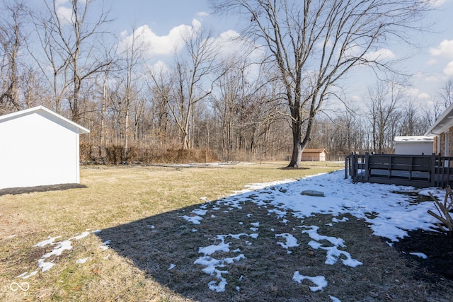 view of yard layered in snow