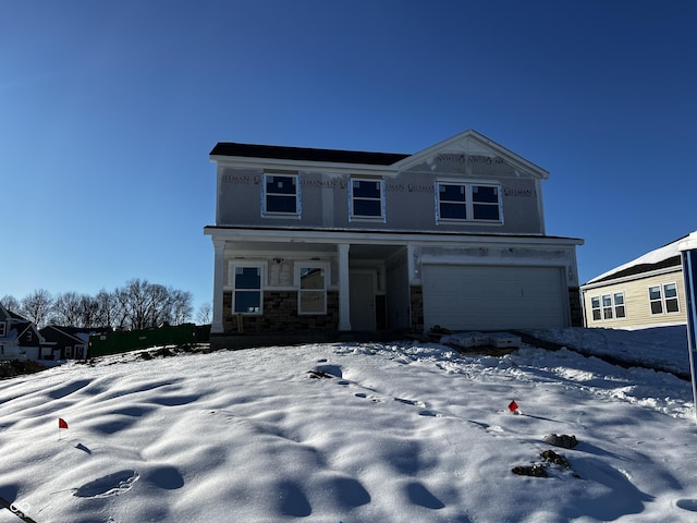 view of front of home with a garage