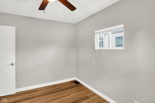 unfurnished room featuring hardwood / wood-style flooring and ceiling fan