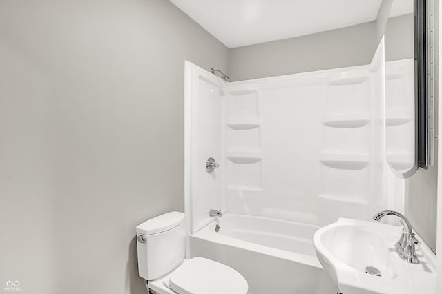 full bathroom featuring sink, toilet, and shower / washtub combination