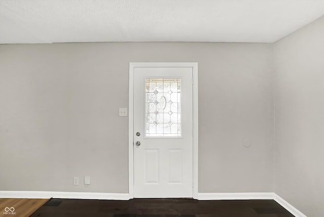 foyer with hardwood / wood-style flooring