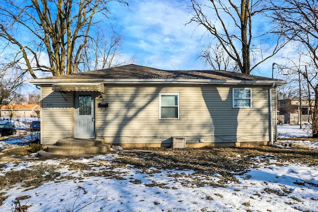 view of snow covered property