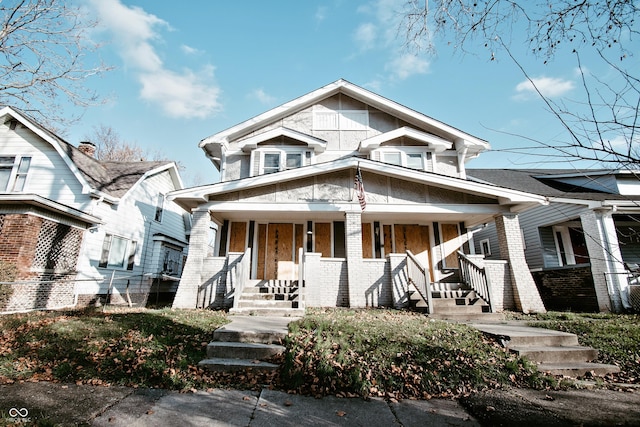 bungalow-style home with a porch