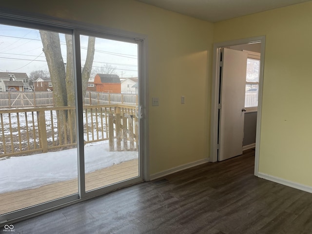 entryway with dark hardwood / wood-style floors