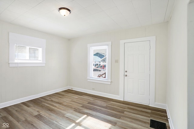 spare room featuring hardwood / wood-style flooring