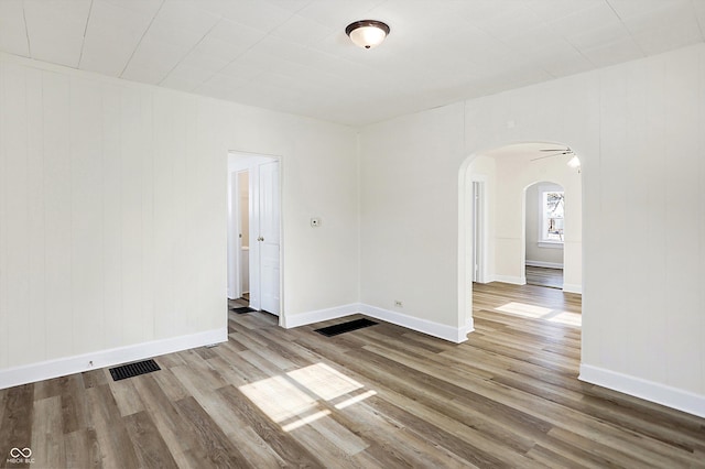 unfurnished room featuring light hardwood / wood-style floors