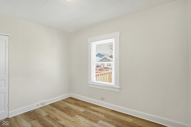 unfurnished room featuring light hardwood / wood-style flooring