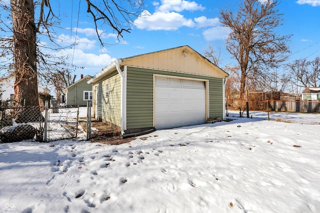 view of snow covered garage