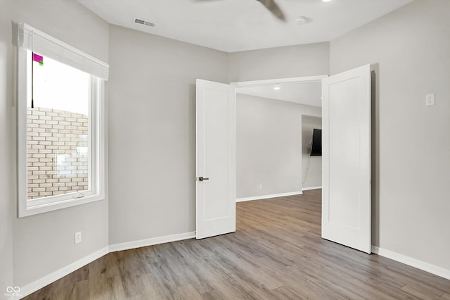 empty room featuring light hardwood / wood-style floors