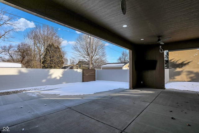 snow covered patio with ceiling fan