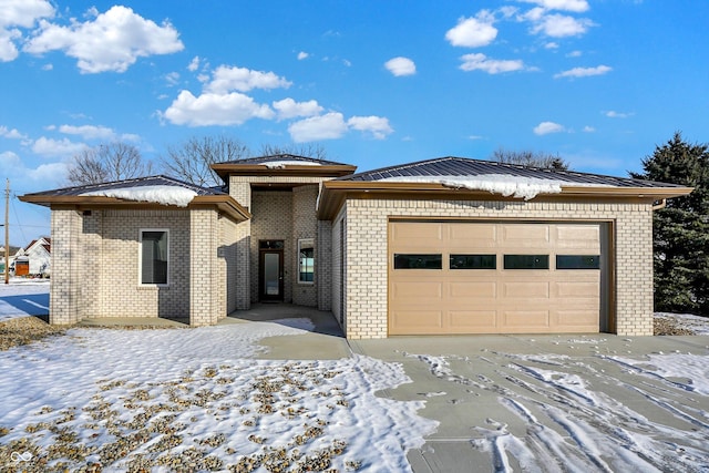 prairie-style house with a garage