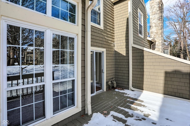 view of snow covered deck