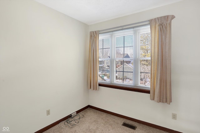 empty room featuring carpet