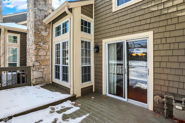 view of snow covered deck