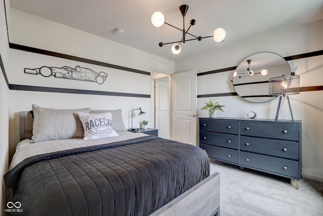 carpeted bedroom with a chandelier