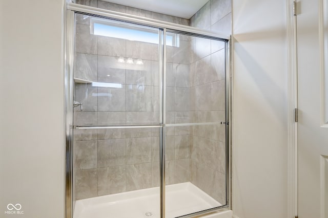 bathroom with walk in shower